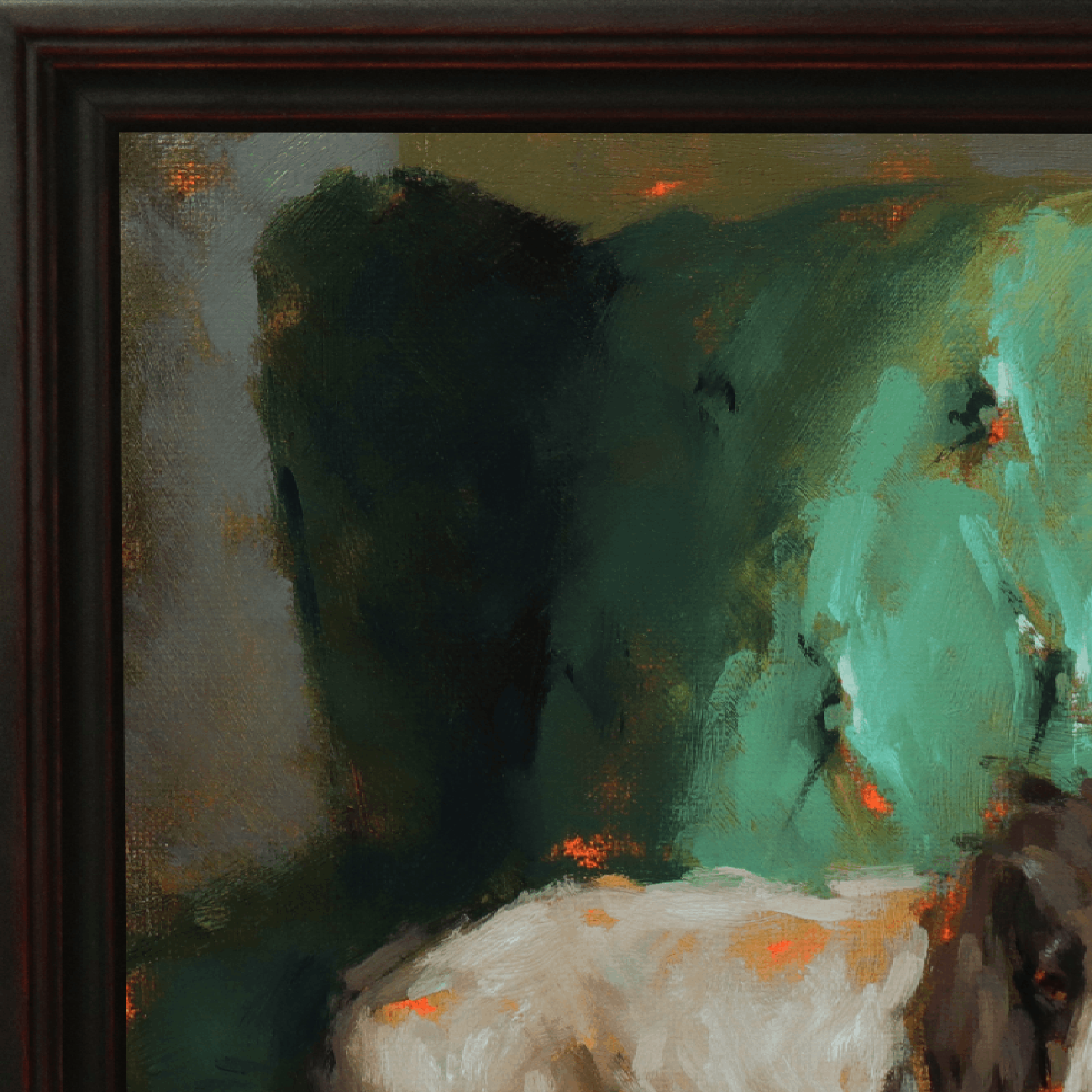Close-up of a framed abstract painting with dark green, teal, cream, and orange brushstrokes, bordered by a dark brown wooden frame.