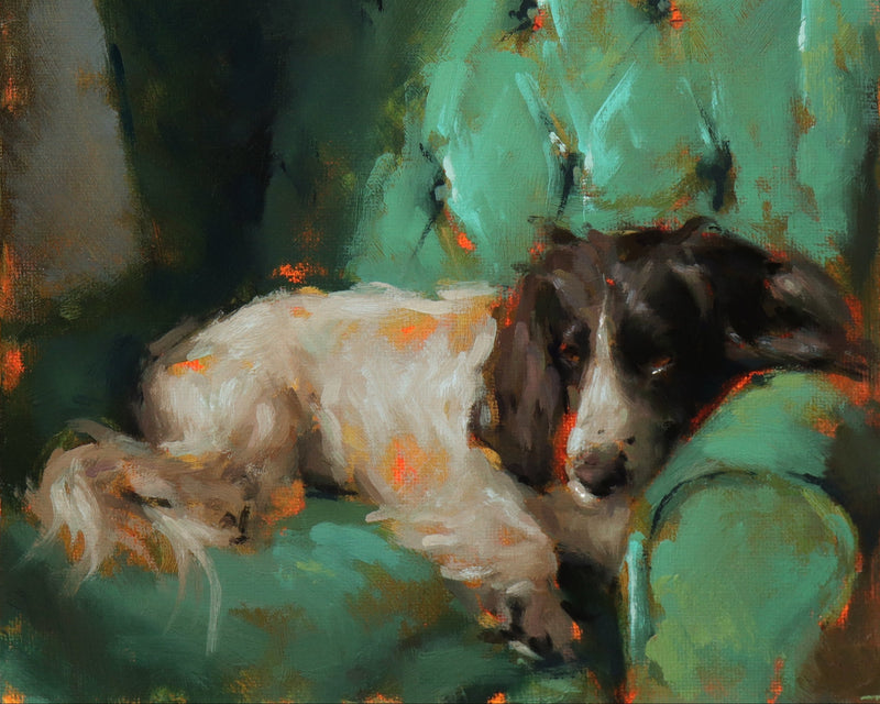 Painting of a dog lying on a green couch