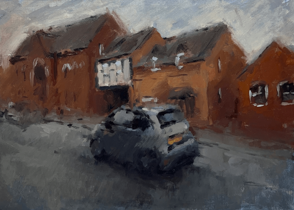 Impressionistic painting of a street scene with reddish-brown brick buildings, a dark gray car in the foreground, and a pale gray-blue sky.