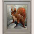 Framed painting of a red squirrel standing in snow, with a light gray frame and a light beige background around the frame.