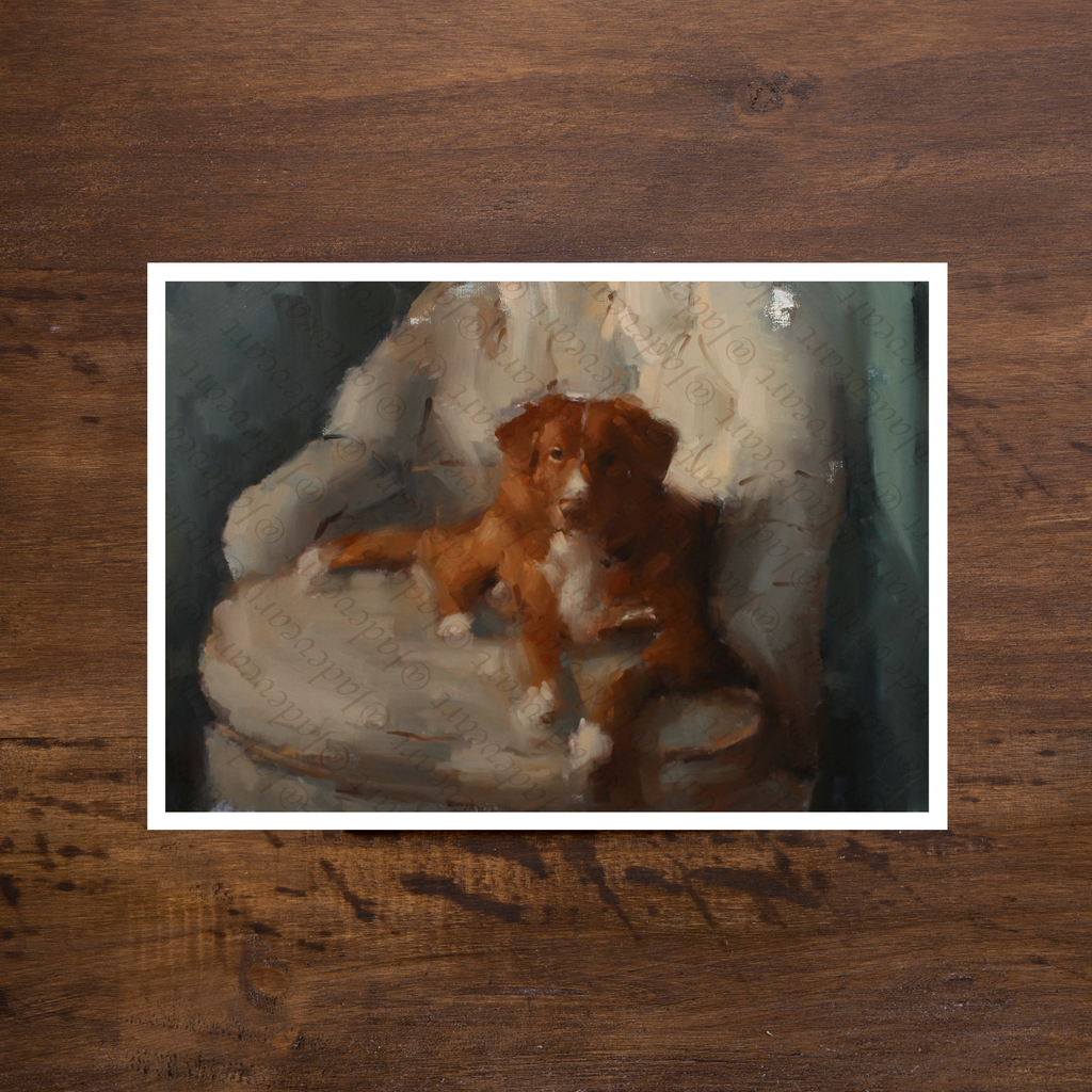 A vertical art print depicting a painted sea otter resting on water, displayed flat on a dark brown wooden surface. The print features a gray-blue water background, a brown and cream-colored otter, and a teal water foreground.