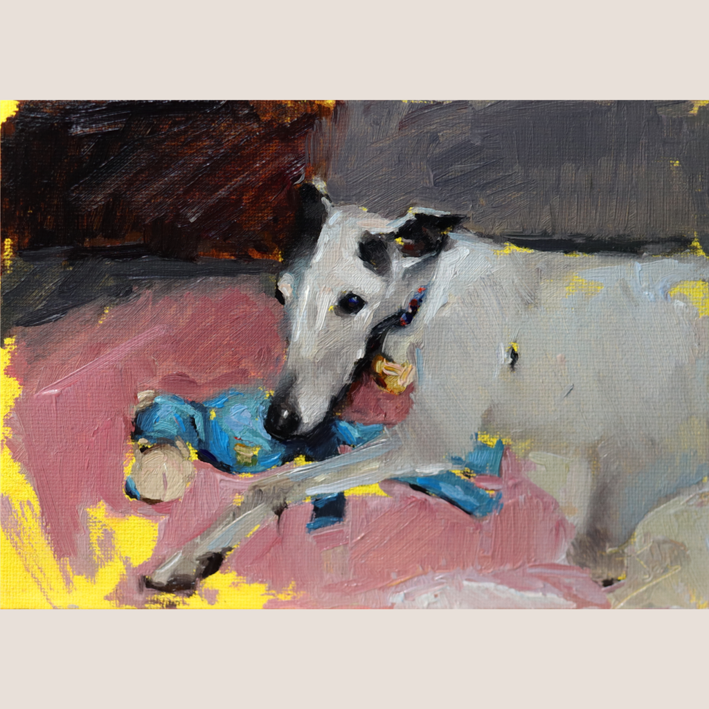 An impressionistic oil painting of a white and black dog lying on a pink and red sofa and biting a blue stuffed toy, with yellow paint accents, set against a light beige border.
