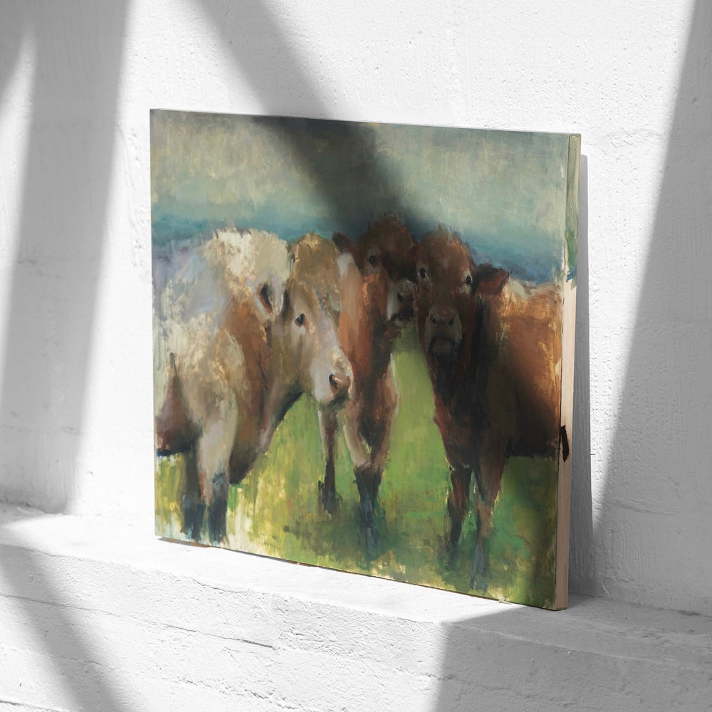 Painting of four cows standing together on a grassy field.