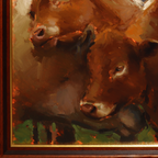 Close-up of an oil painting depicting two brown calves with warm golden and green brushstrokes, framed by a dark wood border with a gold inner edge.